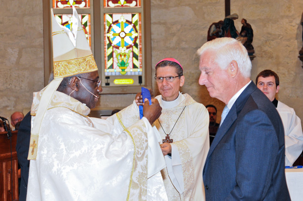 Cardinal Robert Sarah and Archbishop Garcia-Siller inducting Bill Klesse into the Good Shepherd Legacy Society.
